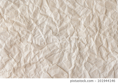 Recycled crumpled beige paper texture background 101944146