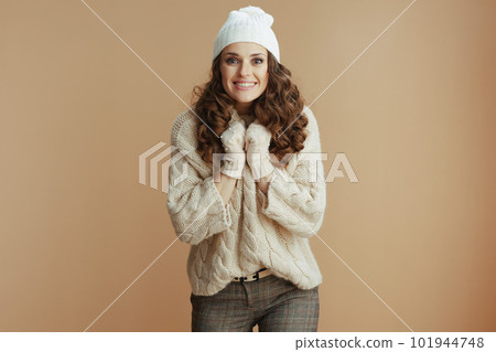 excited modern female isolated on beige background 101944748