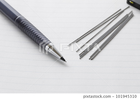 Mechanical pencil and lead on the notebook 101945310
