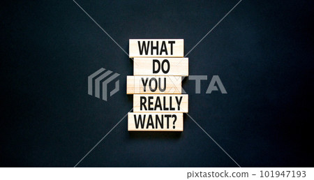 What do you really want symbol. Concept words What do you really want on wooden block. Beautiful black table black background. Business and what do you really want concept. Copy space. What do you really want symbol. Concept words What do you really want on wooden block. Beautiful black table black background. Business and what do you really want concept. Copy space. 101947193