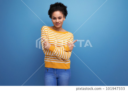 afro brunette 20s latin young woman with ponytail in casual wear over isolated background 101947333