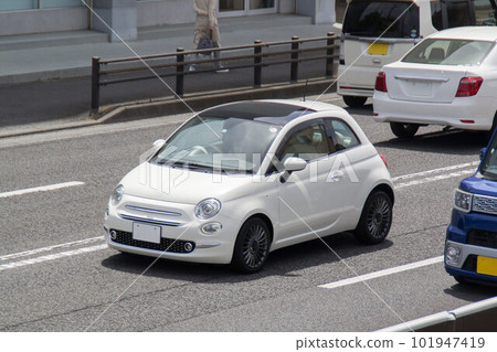 Small passenger car road driving Small passenger car road driving 101947419