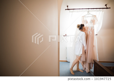 Portrait of beautiful bride with fashion veil at wedding morning Portrait of beautiful bride with fashion veil at wedding morning 101947725
