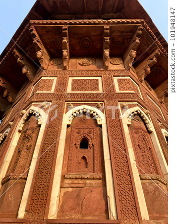 The famous red fort in the city of Agra, India. Tourists visit a popular tourist attraction. The famous red fort in the city of Agra, India. Tourists visit a popular tourist attraction. 101948147