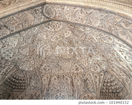 The famous red fort in the city of Agra, India. Tourists visit a popular tourist attraction. The famous red fort in the city of Agra, India. Tourists visit a popular tourist attraction. 101948152