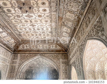 The famous red fort in the city of Agra, India. Tourists visit a popular tourist attraction. The famous red fort in the city of Agra, India. Tourists visit a popular tourist attraction. 101948153