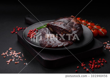 Delicious smoked or cured mahan horse meat sausage with spices and herbs 101948456