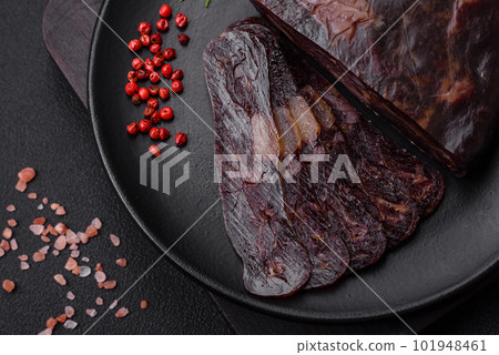 Delicious smoked or cured mahan horse meat sausage with spices and herbs 101948461