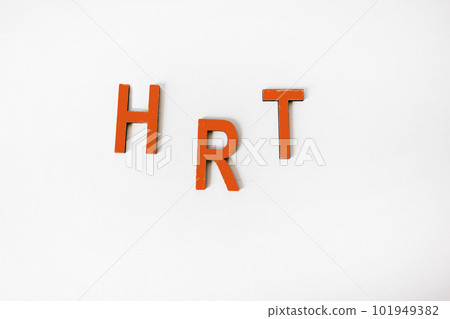 HRT hormone replacement therapy abbreviation on wooden red letters and white background 101949382