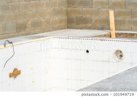 construction of a swimming pool at a family house construction of a swimming pool at a family house 101949719