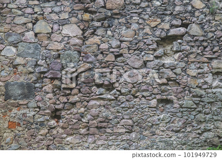 Old crumbling stone wall in an castle Old crumbling stone wall in an castle 101949729