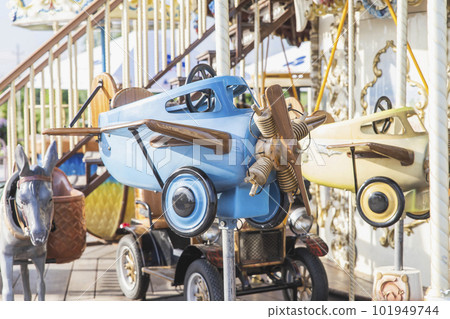 toy plane on a beautiful carousel in an amusement park in Ukraine 101949744