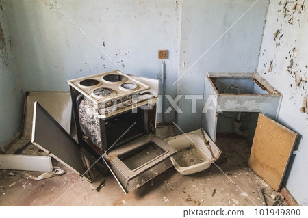 looted kitchen in an abandoned house in Pripyat Ukraine 101949800