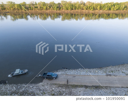 launching a fishing boat at a ramp - sunrise aerial view of Missouri River at Dalton Bottom 101950091