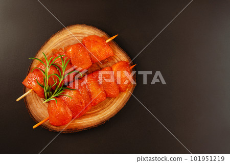Chicken breast Fillets.Raw marinated chicken fillet skewers on a black background.Marinated Fresh.Closeup of chicken meat.Procurement for designers.Food concept.Top view. Chicken breast Fillets.Raw marinated chicken fillet skewers on a black background.Marinated Fresh.Closeup of chicken meat.Procurement for designers.Food concept.Top view. 101951219