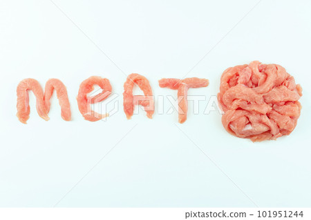 The word meat written with raw pieces of meat on a white background.Fresh pieces of turkey meat.Raw chicken. The word meat written with raw pieces of meat on a white background.Fresh pieces of turkey meat.Raw chicken. 101951244