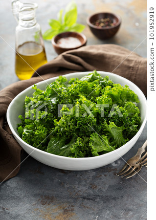 Fresh kale with olive oil, salt and pepper Fresh kale with olive oil, salt and pepper 101952919
