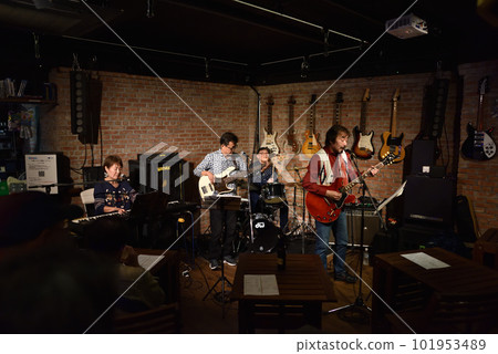 Blues band playing at a live house Blues band playing at a live house 101953489