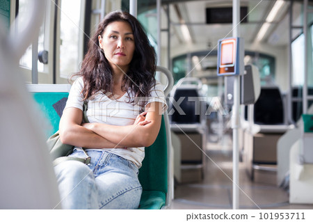 Woman sitting in tram Woman sitting in tram 101953711