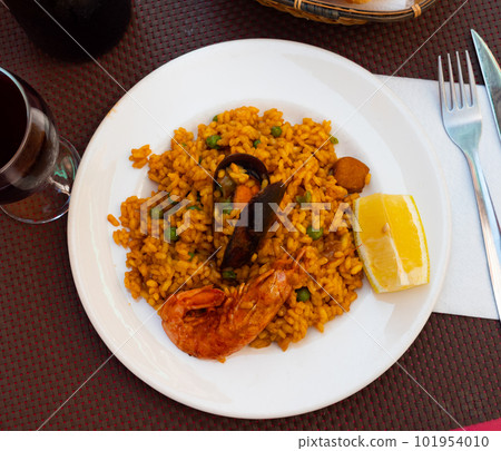 Just cooked paella de marisco on table Just cooked paella de marisco on table 101954010