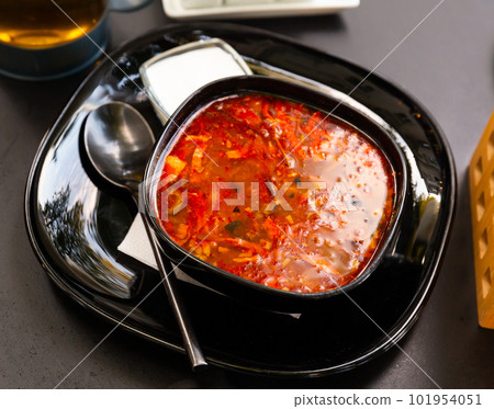 National dish of Russian cuisine is Solyanka soup National dish of Russian cuisine is Solyanka soup 101954051