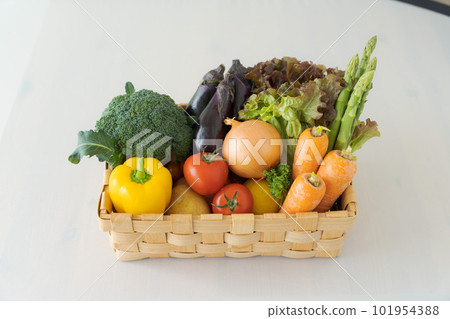 Photo of a basket full of vegetables Photo of a basket full of vegetables 101954388