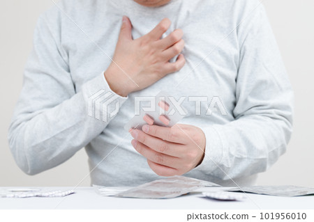 A man suffering with medicine. drug hazards and illnesses A man suffering with medicine. drug hazards and illnesses 101956010
