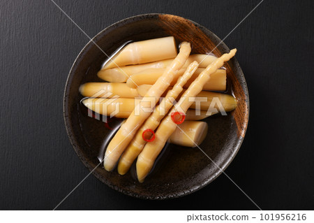 Thin bamboo shoots pickled in soy sauce Thin bamboo shoots pickled in soy sauce 101956216