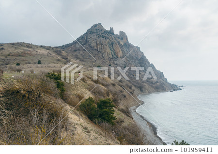 View of the crest of the coastal ridge Karagach in spring. Karadag Reserve. Crimea View of the crest of the coastal ridge Karagach in spring. Karadag Reserve. Crimea 101959411
