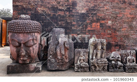 beautiful Colossal Buddha head, in Monastery 1 of Ratnagiri Buddhist Monastery, Odisha, India. beautiful Colossal Buddha head, in Monastery 1 of Ratnagiri Buddhist Monastery, Odisha, India. 101960343