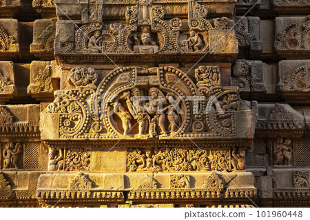 Carving of Lord Shiva Bhikshatana with Annapurna giving arms, Parshurameshwara Temple, Bhubaneshwar, Odisha, India. Carving of Lord Shiva Bhikshatana with Annapurna giving arms, Parshurameshwara Temple, Bhubaneshwar, Odisha, India. 101960448