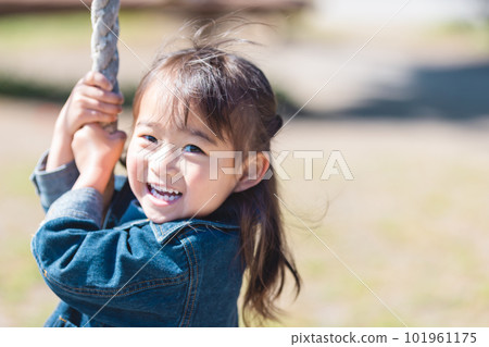 Girls playing in the park Girls playing in the park 101961175