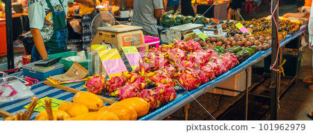 Tropical fruits in fruit market at night streetfood market Tropical fruits in fruit market at night streetfood market 101962979