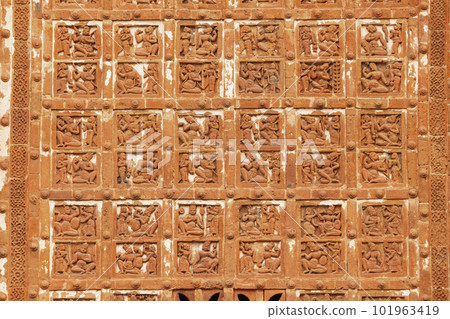 Ancient stories sculpted on the Jor Bangla Temple, Bishnupur, West Bengal, India. Ancient stories sculpted on the Jor Bangla Temple, Bishnupur, West Bengal, India. 101963419