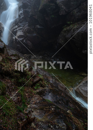 A waterfall flowing in the mist Tadachi Falls A waterfall flowing in the mist Tadachi Falls 101968041