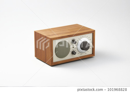 A wooden radio with a classic look that plays sweet music 101968828
