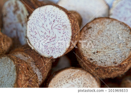Stack of taro on a market stall Stack of taro on a market stall 101969833