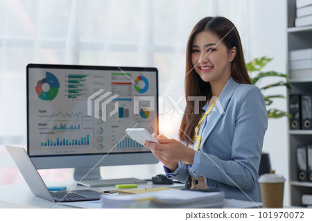 Accountant woman working on laptop and do document, tax, exchange, research, accounting and Financial advisor concept 101970072