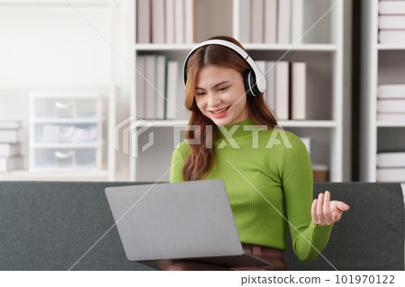 Attractive Asian woman resting comfortable living room and using laptop computer, Relax, Sofa, Lifestyle 101970122