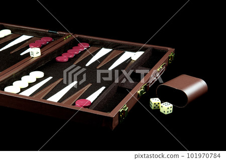 Backgammon Game Isolated on a Black Surface 101970784
