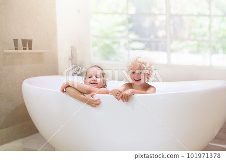 Kids in bath rub. Child bathing. 101971378
