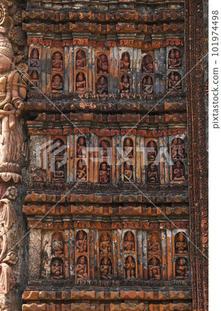 Carvings of saints and musicians on the Char Bangla Temple, Jiaganj, West Bengal, India. Carvings of saints and musicians on the Char Bangla Temple, Jiaganj, West Bengal, India. 101974498