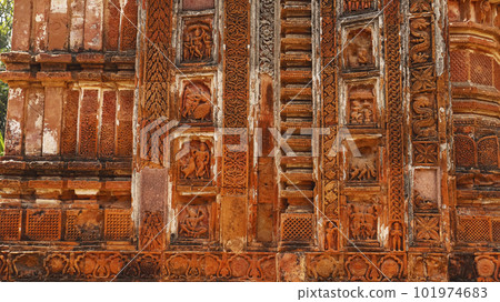 Carvings on the Bricks on wall of Charbangla Temple, Jiaganj, West Bengal, India. 101974683