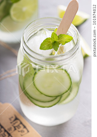 Lime and cucumber lemonade in mason jars 101974812
