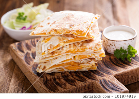 Quesadillas with cheddar and chicken 101974919