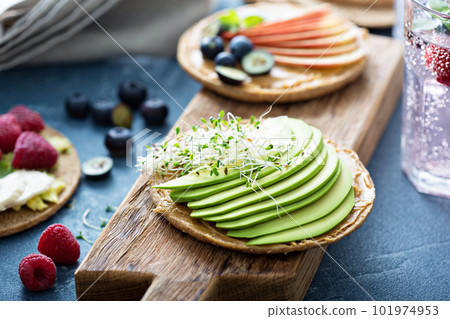 Wholegrain bread with variety of toppings Wholegrain bread with variety of toppings 101974953