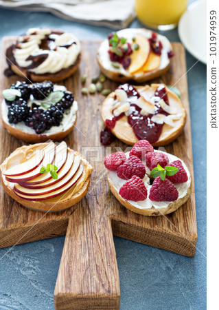 Variety of bagels on a board 101974959