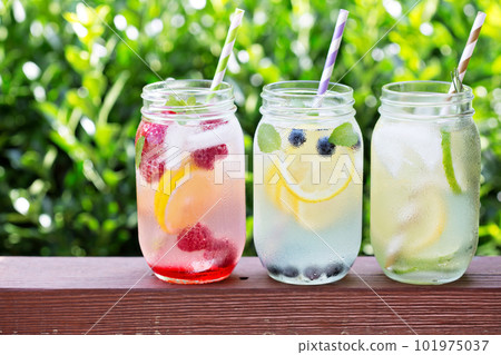 Variety of lemonade in jars 101975037