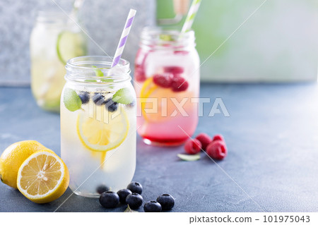 Variety of lemonade in jars 101975043