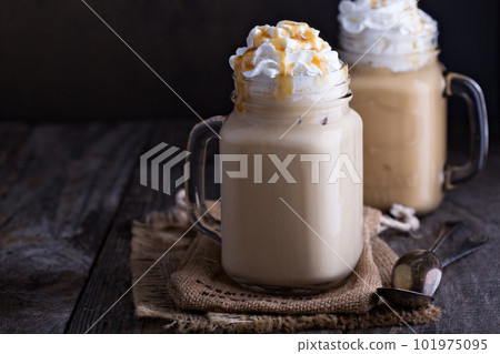 Iced coffee with caramel and whipped cream 101975095